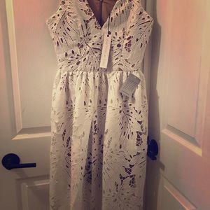 White lace sleeveless cocktail dress